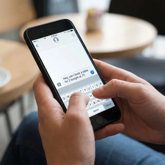 See how reply-to-book SMS works in real-time.